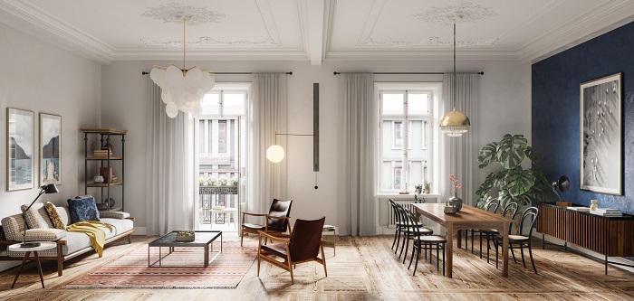 Modern living room with hardwood floors, a long wooden table, several chairs and other furniture, as well as ample lighting throughout. 