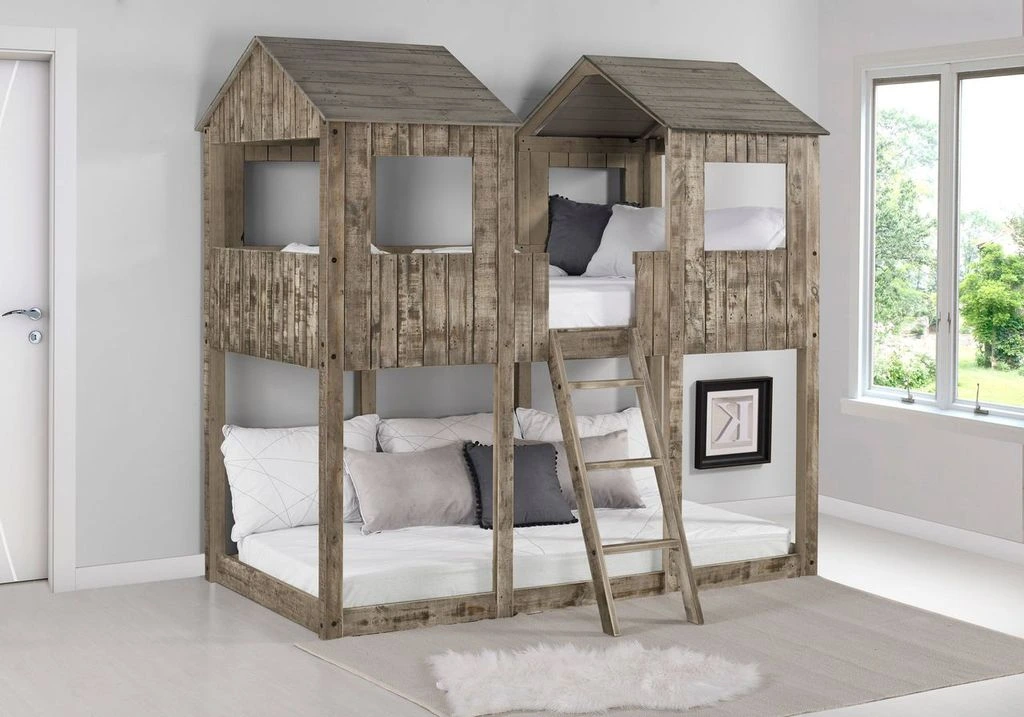 The Donco Kids treehouse loft bed in a slate gray finish with bedding and décor 