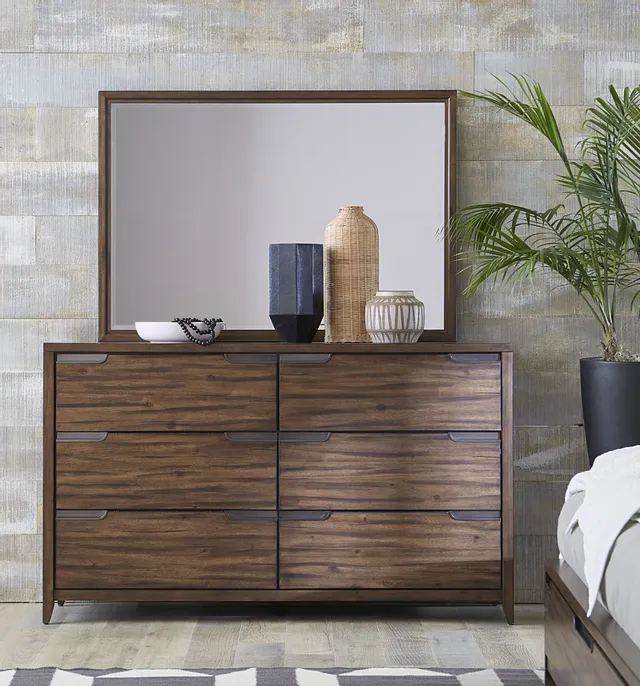 The Aspenhome Peyton collection mid century modern dresser with décor 