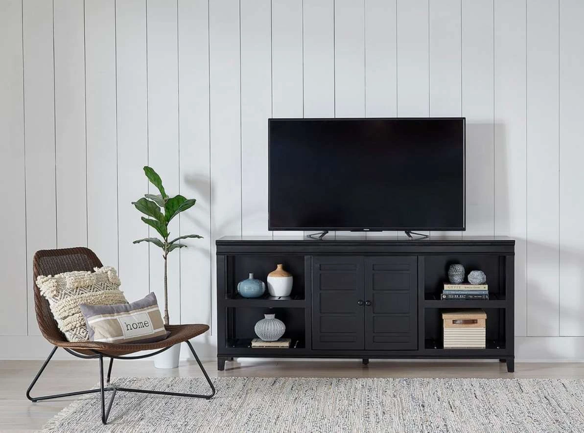 The Progressive Furniture Reagan Raven 72” media console with modern décor 