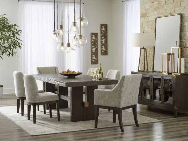 The Signature Design by Ashley Burkhaus dining chairs with a trestle table and modern décor 