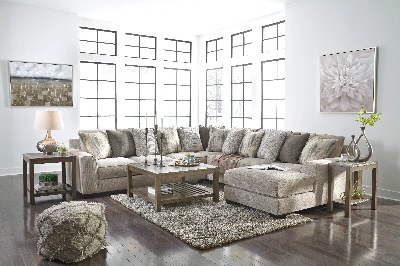 The Benchcraft Ardsley collection 5-piece sectional sofa with décor 
