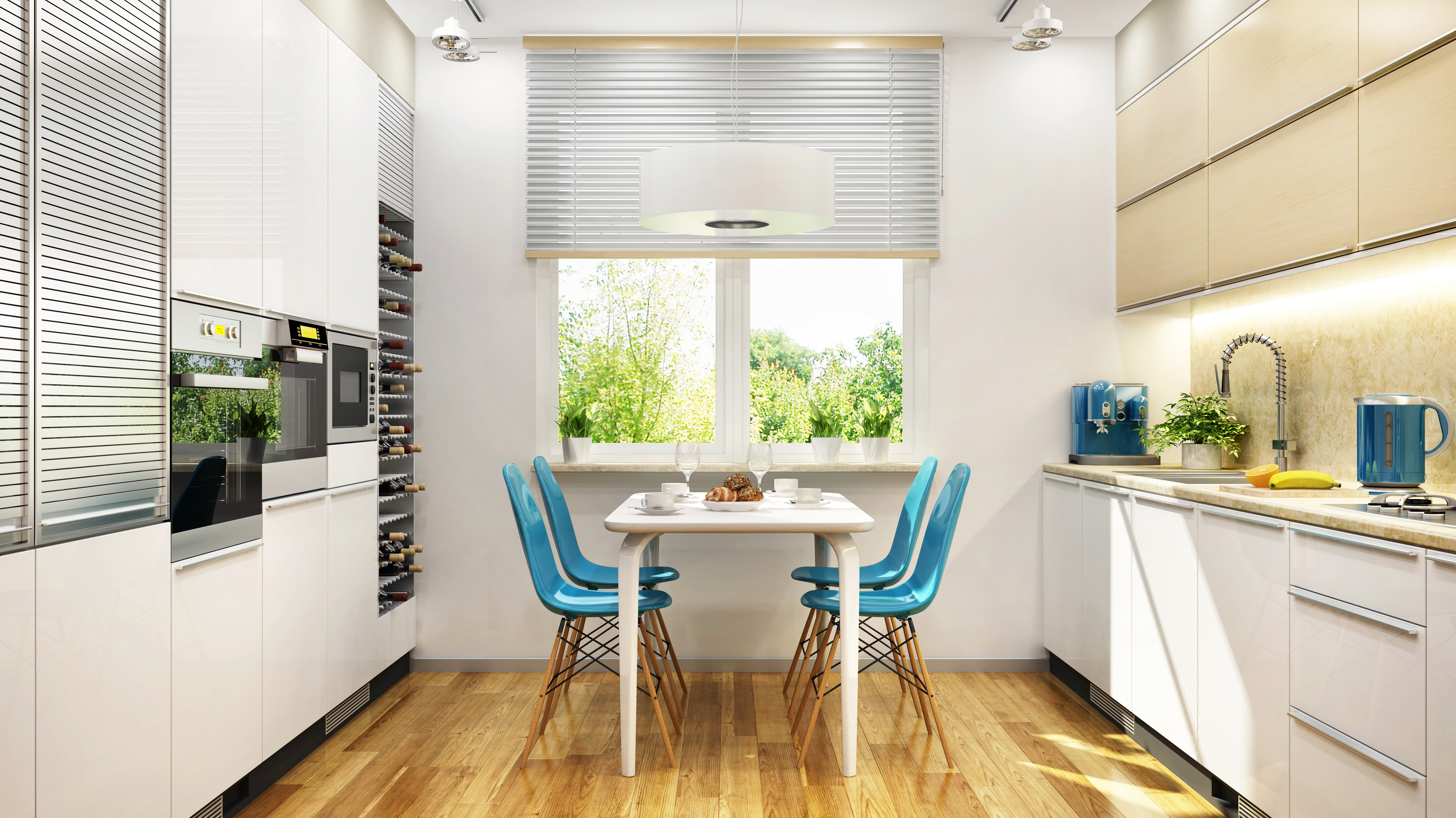 A modern kitchen with a dining room table and chairs