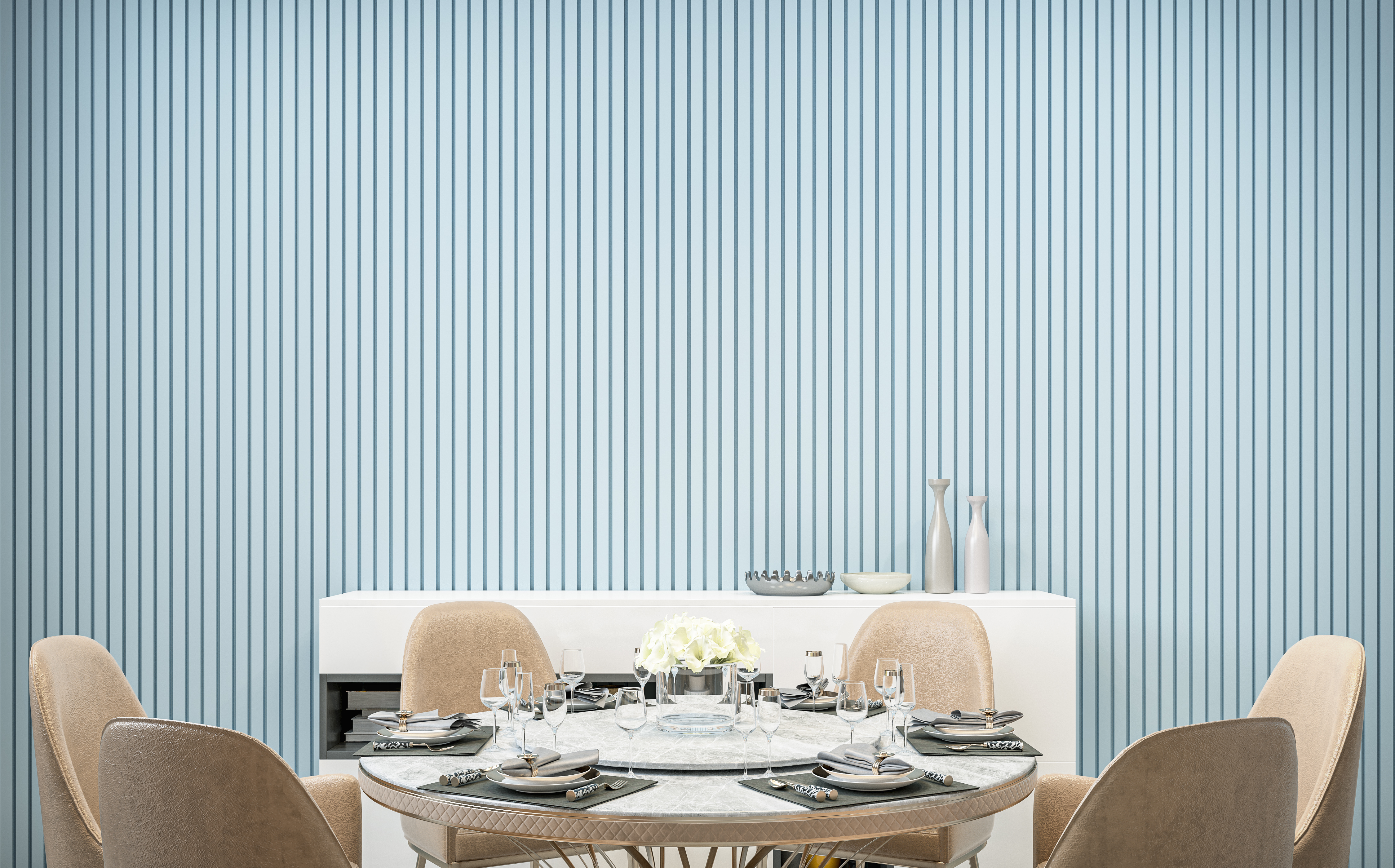 A dining room with blue wall panels and a round dining room set with dinnerware 