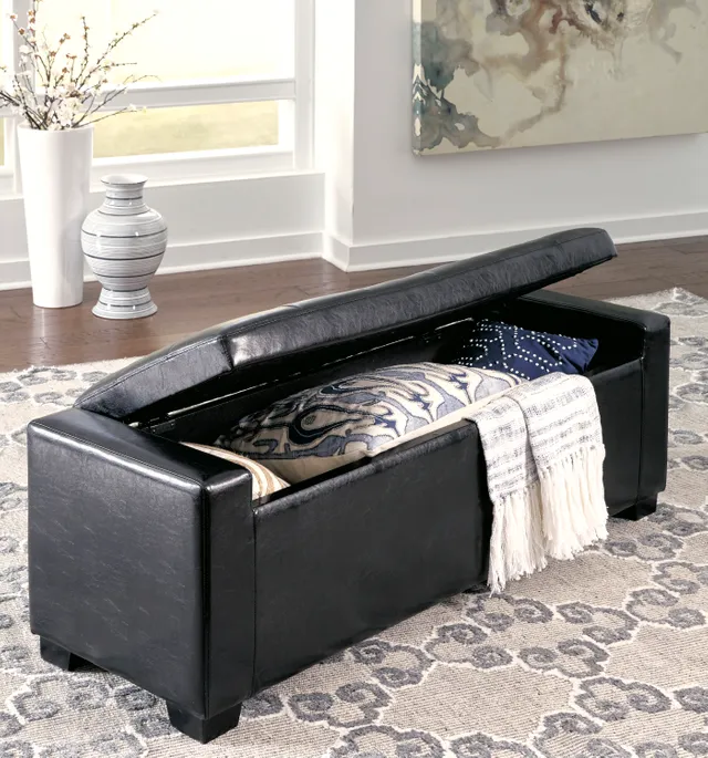Signature Design by Ashley black upholstered storage bench