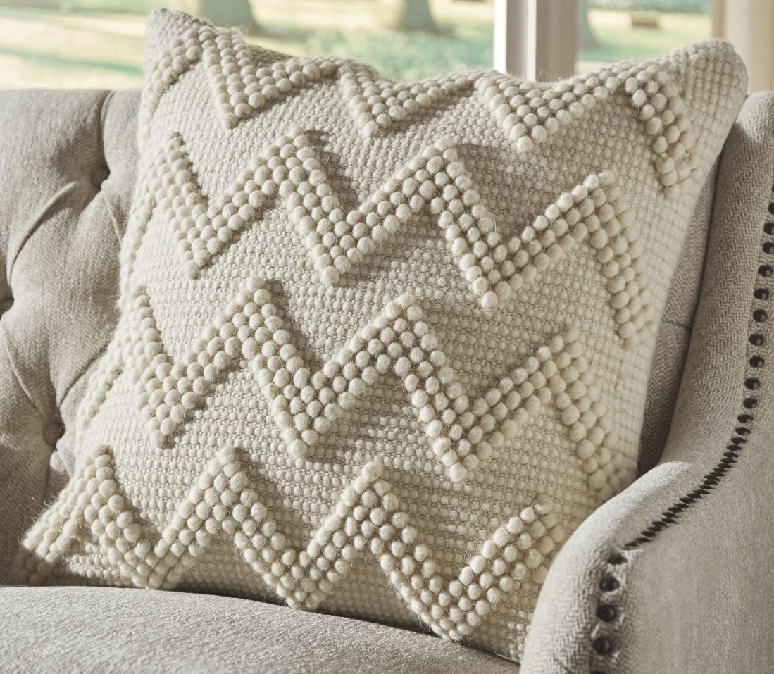 The Signature Design by Ashley Amie collection throw pillow 