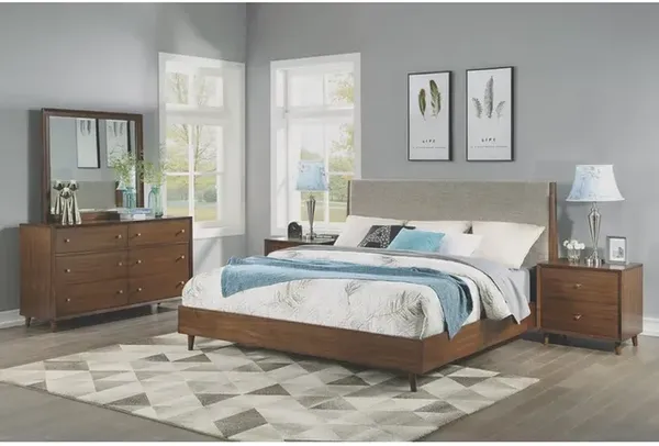 The Flexsteel Ludwig collection platform bed with matching bedroom pieces and décor 