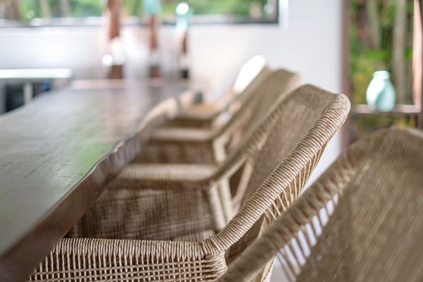 A close-up shot of wicker-style chairs 
