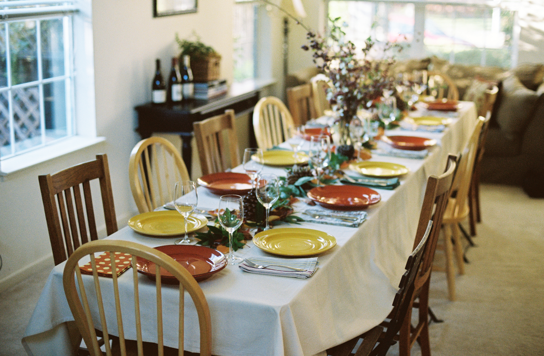 dining room Thanksgiving table scape with plenty of chairs 