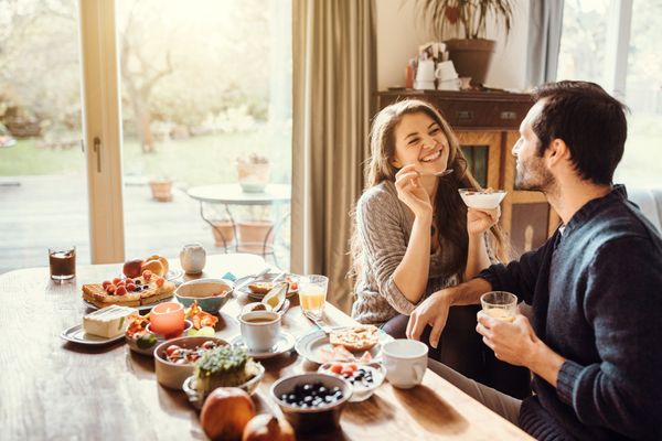 Couple Eating at a Dining Table