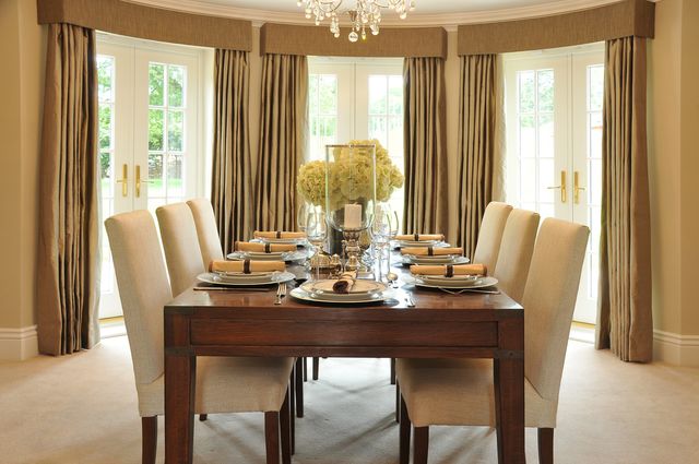 front view of a large dining room table in a luxury dining room