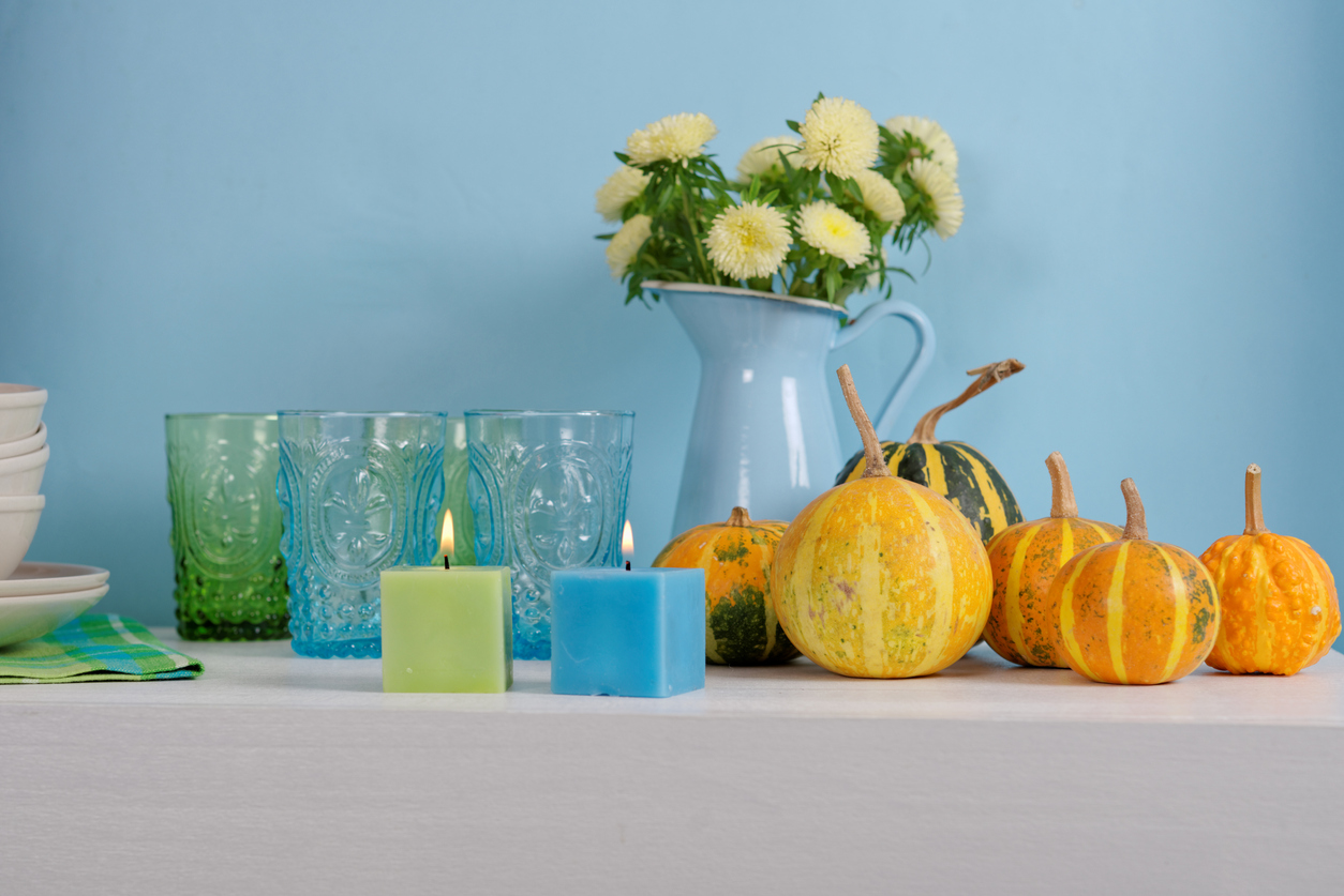 sideboard with Thanksgiving centerpiece 