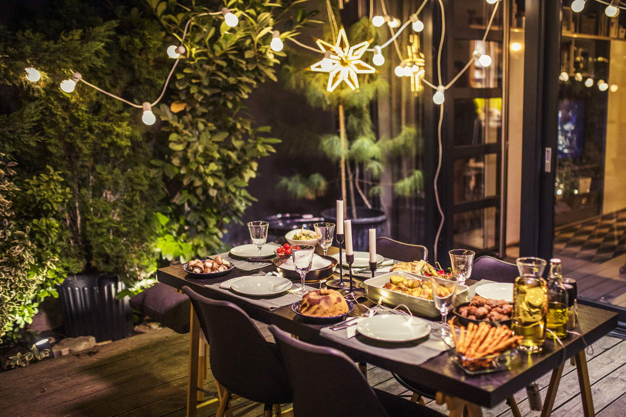 table ready for dinner party at house backyard