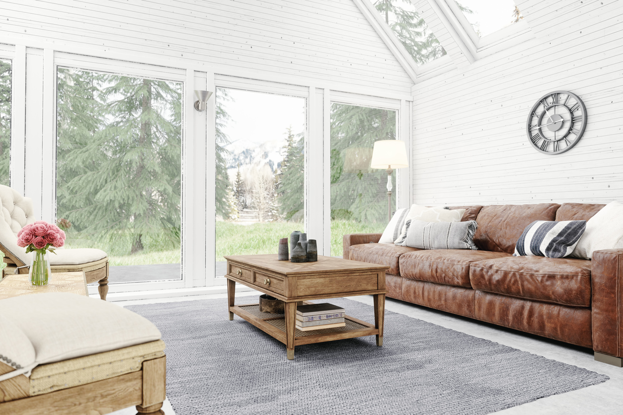 neutral living room with wood beams