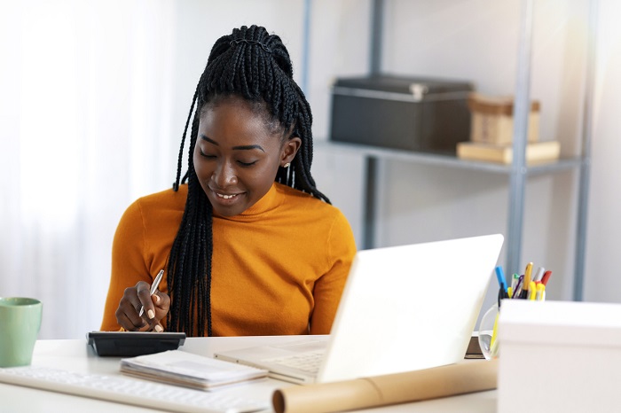 woman calculating her financing options