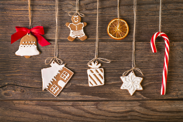 homemade gingerbread cookie garland on a wood background