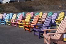 collection of colorful adirondack chairs