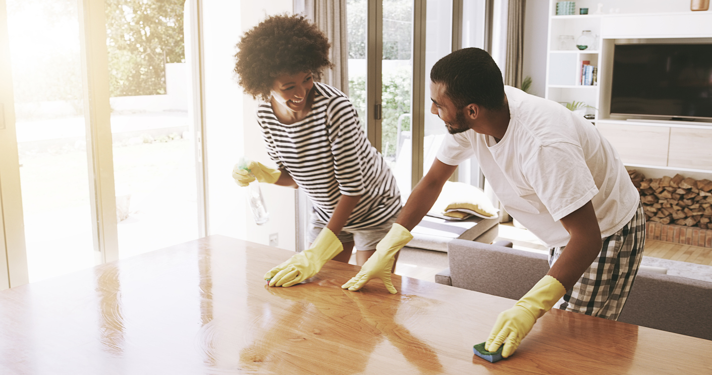 young couple keeps their kitchen table clear 