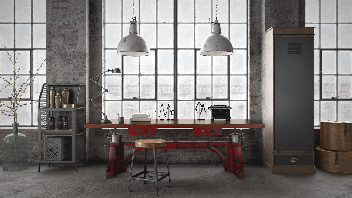 industrial style kitchen with red adjustable table and chicken wire cabinetry