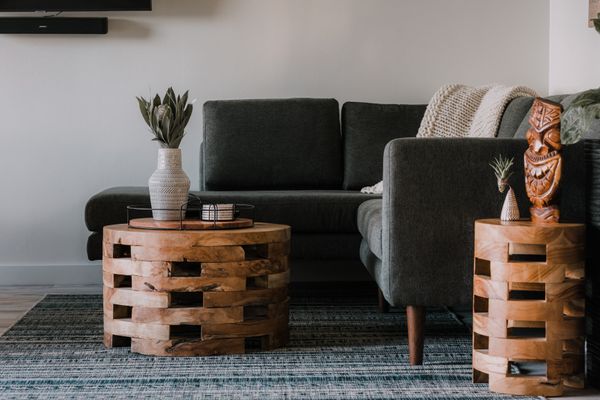 Black sofa sectional and wood coffee table