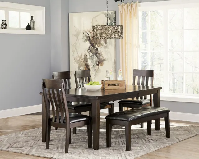 The Signature Design by Ashley Haddigan collection dining room set with modern décor 