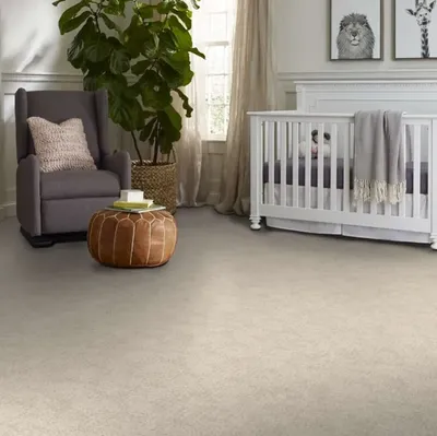 The Shaw Floor Caress collection carpet in a nursery 