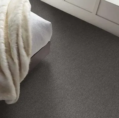 The Shaw Floors Cabana Bay collection carpeting in a bedroom  