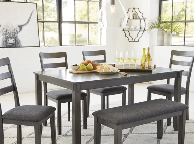 The Signature Design by Ashley Bridson collection 6-piece dining table with décor 