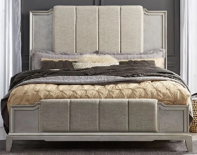 The Liberty Furniture Luxe Living collection bed with bedding and décor 
