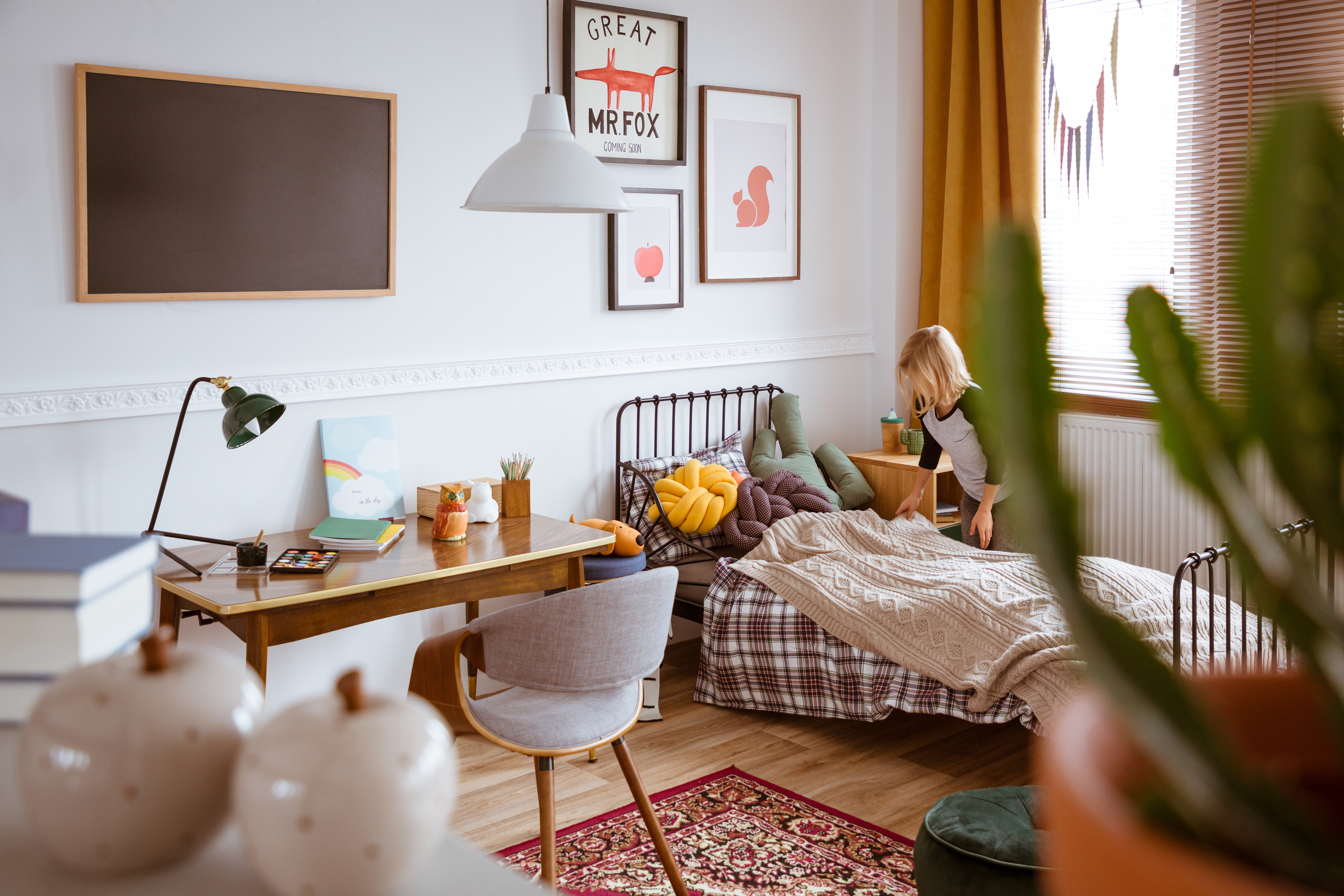 A child making in a bedroom in a children’s bedroom 