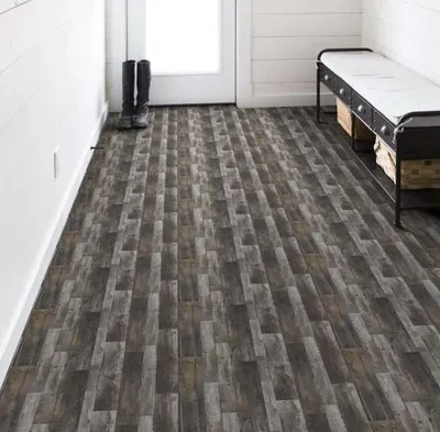 The Shaw Floors Resilient Residential vinyl flooring in a mudroom 