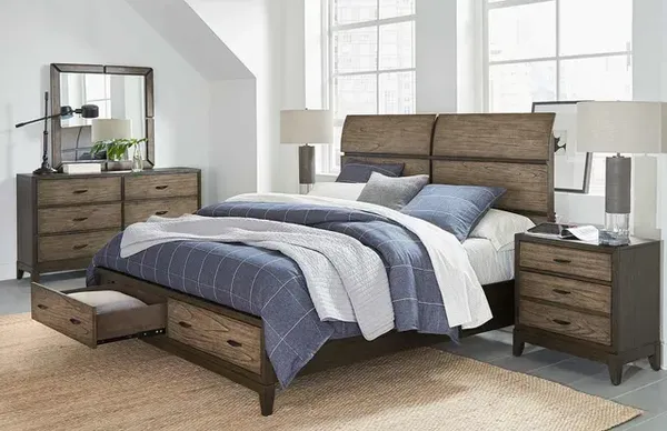 A rustic style sleigh bed with decor