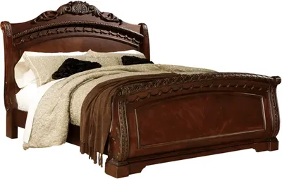Front view of the Millennium by Ashley North Shore collection sleigh bed 