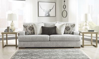 Front view of the Benchcraft Mercado collection sofa with décor 