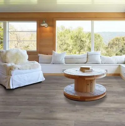 The Shaw Floors Floorte Antica collection vinyl flooring in a sunroom 