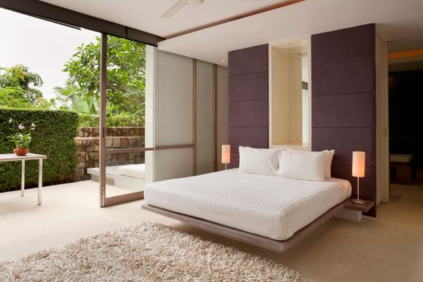 A platform bed featured in a modern bedroom 