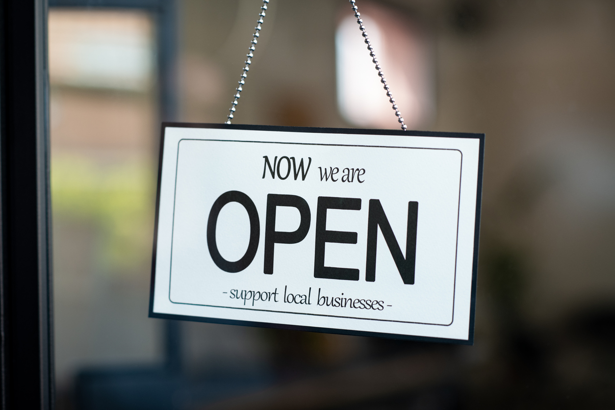  we’re open and shop local sign 