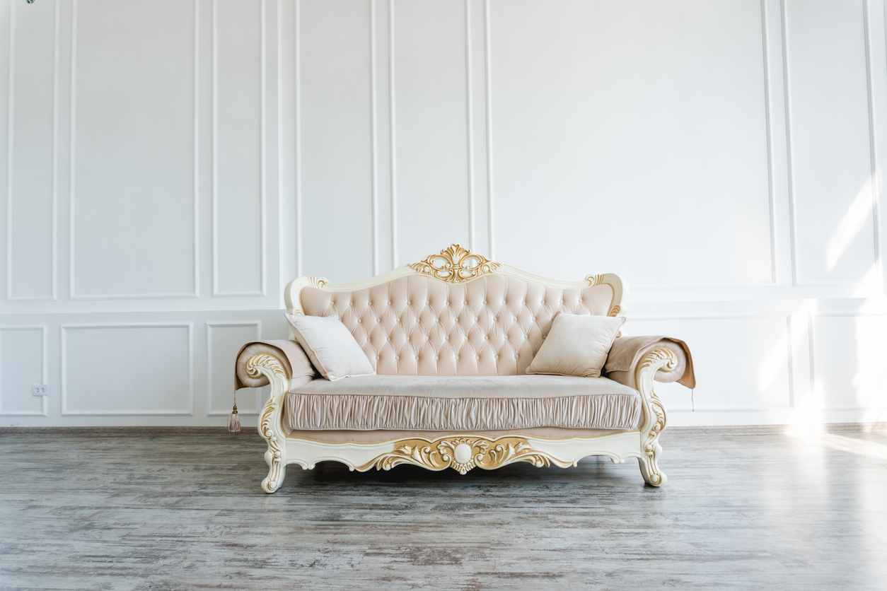Traditional style sofa in an empty room 