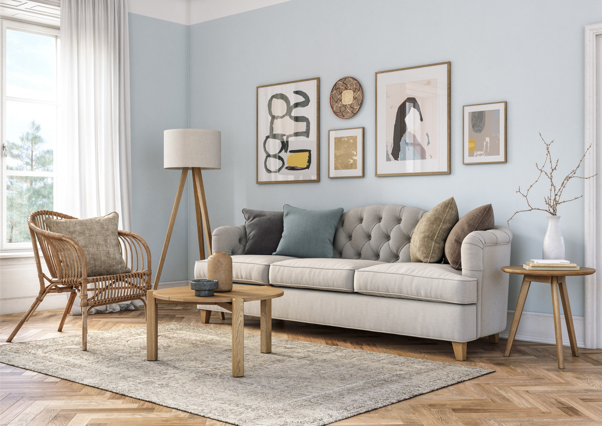 Living room with accent chair, wall art, and transitional style sofa