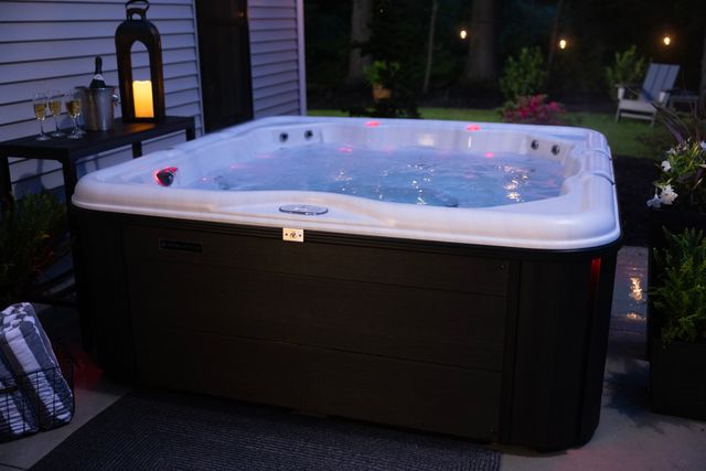 front view of a Nordic saltwater hot tub in a modern backyard sapce