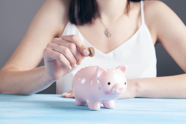 Saving Money in Piggy Bank