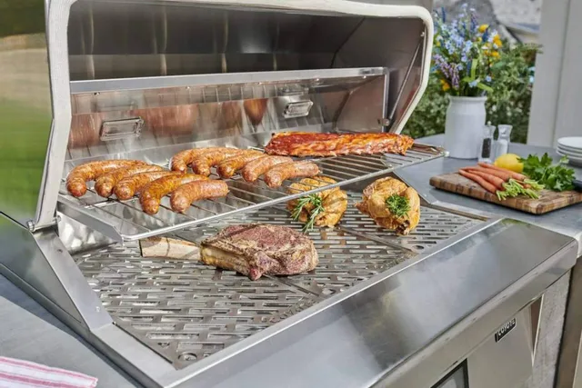 Food being cooked on an outdoor built in grill