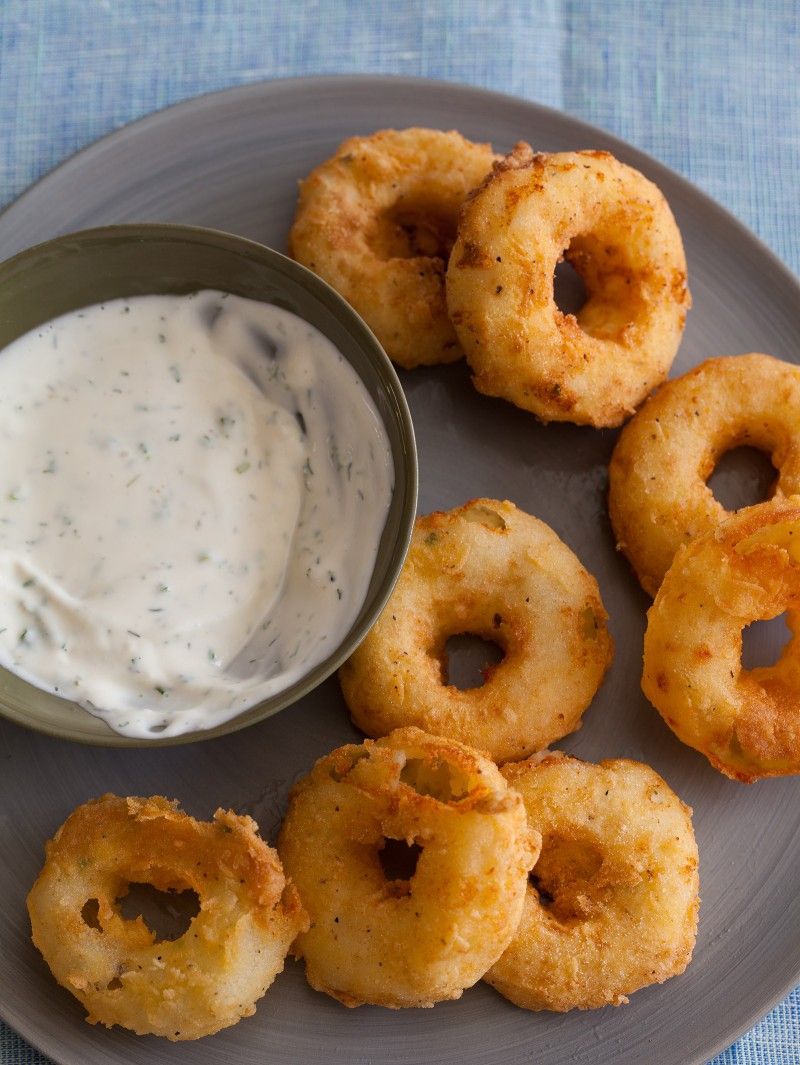 Potato rings on a plate with dip