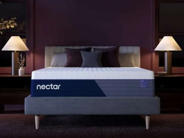 The Nectar Luxe M14231 mattress in a bed with décor 