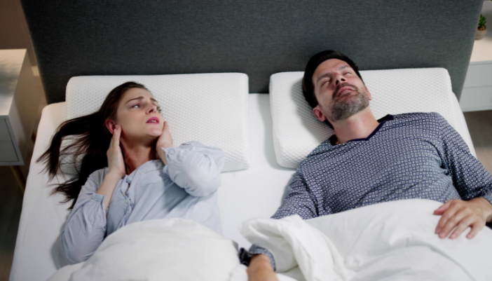 Woman unable to sleep because of her husband snores