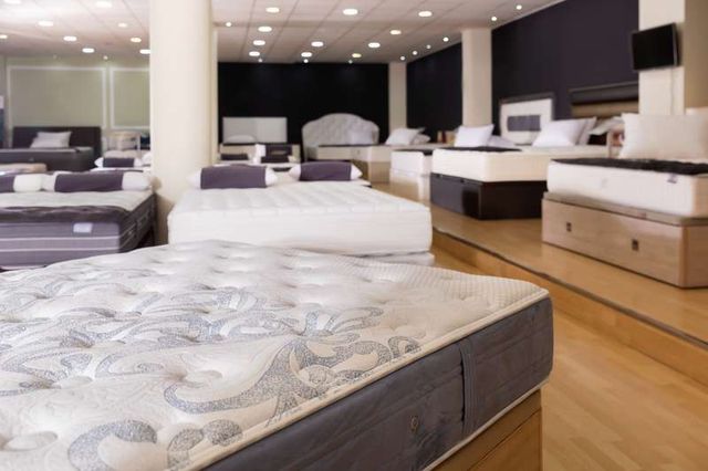 front view of the inside of a mattress store