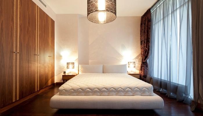 picture of a platform bed in art deco style room