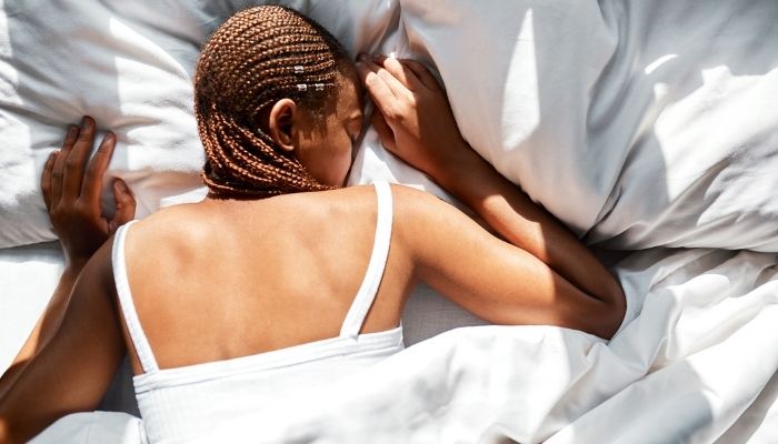 woman sleep on her stomach