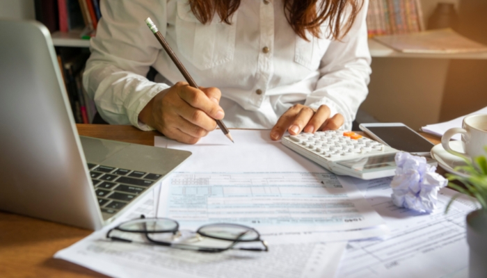 Woman making a budget plan