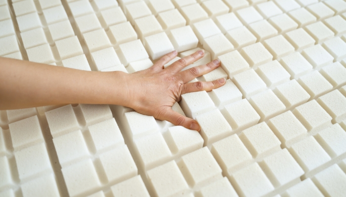 Hand testing the properties of memory foam